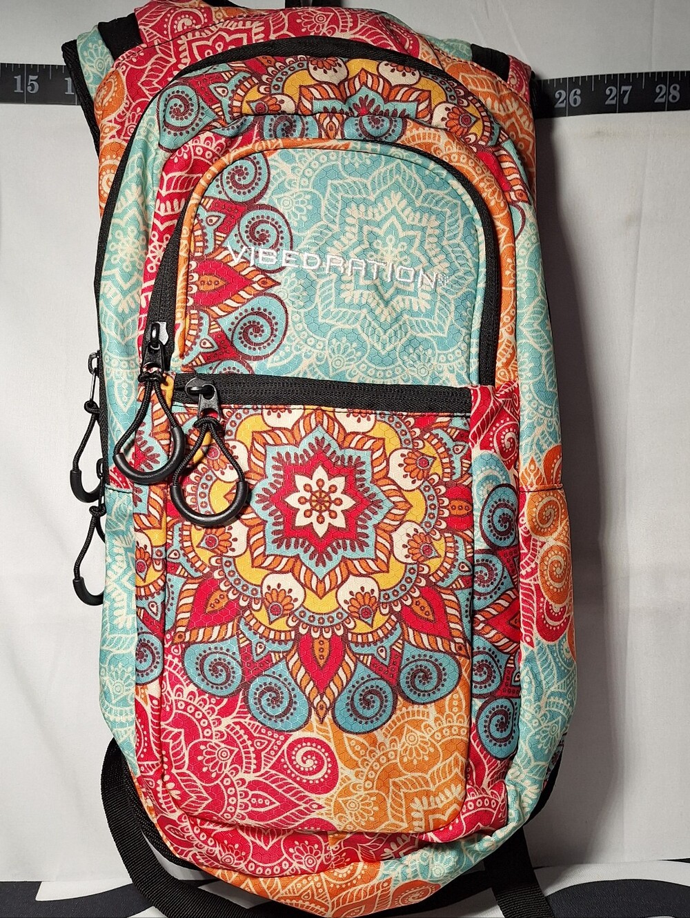 Vibedration Hydration Backpack w/o bladder -turquoise/orange pattern - Used